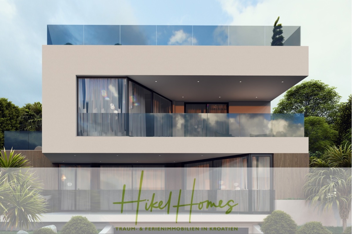 Ein modernes, mehrstöckiges Haus mit großen Glasbalkonen, umgeben von Grünanlagen, mit dem Text "Hikel Homes" und "TRAUM- & FERIENIMMOBILIEN IN KROATIEN" am unteren Rand. - Luxus trifft Meerblick – Ein Anwesen der Extraklasse – Sofort einziehen