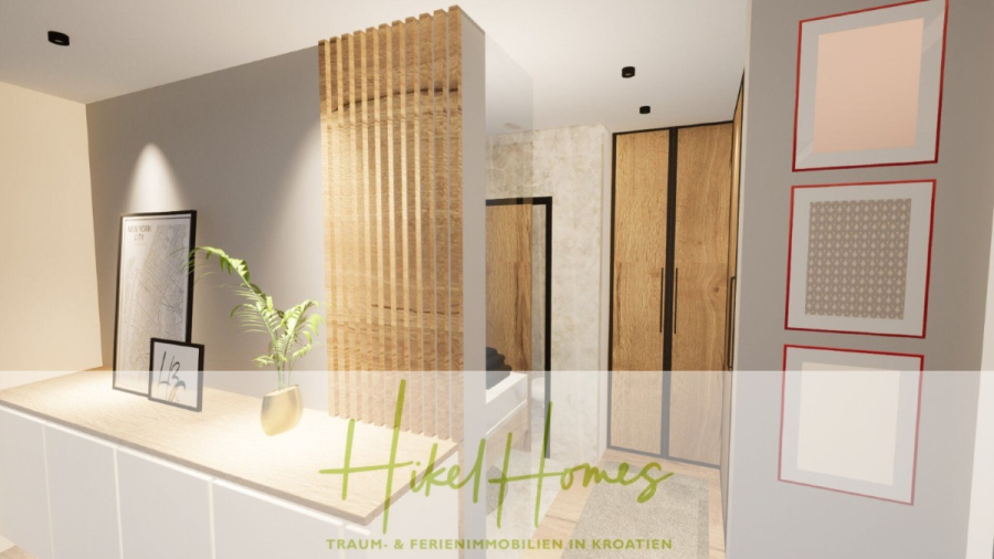 Einziehen im Sommer – Meerblick Neubau-Luxusvilla mit Einrichtung, Infinitypool & Raumkonzept - Modernes Interieur mit hellem Holz und neutralen Tönen, mit einem dekorativen Raumteiler, gerahmter Kunst an hellgrauen Wänden, eingebautem Holzschrank und schlichten weißen Schränken. Der Text "Hikel Homes" steht in grüner Schrift darüber. (44655)