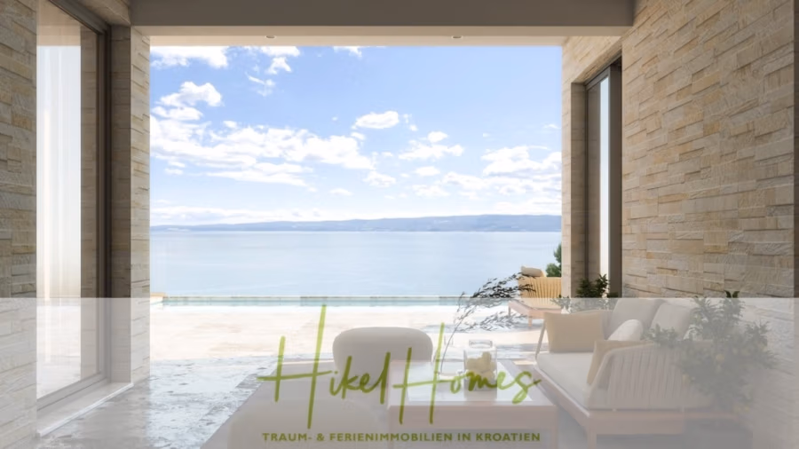 Villa Dalia – von jedem Zimmer aus Meerblick mit 4 Schlafzimmer / 4 Bädern / Loggia / Pool / … - Blick aus einem luxuriösen Zimmer mit Steinmauern auf Pool und Meer. Bequeme Sitzgelegenheiten umfassen zwei Stühle und einen Tisch mit einer Pflanze. Unten steht der Text „Hikel Homes“, darunter „Traum- & Ferienimmobilien in Kroatien“. (41355)